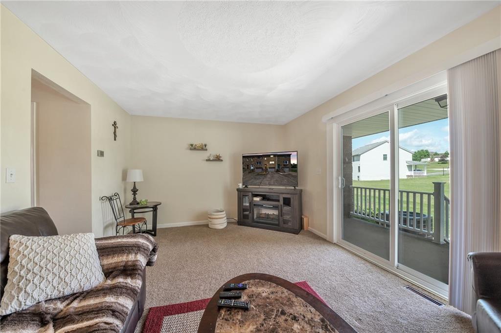 4897 Lucerne Road Indiana, PA 15701 - Photo 11 of 25 a bedroom with furniture and a flat screen tv