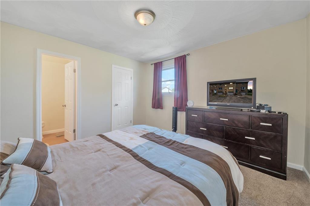 4897 Lucerne Road Indiana, PA 15701 - Photo 13 of 25 a bedroom with a bed and a lamp
