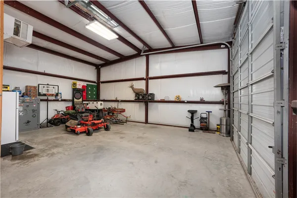 a view of a garage with storage