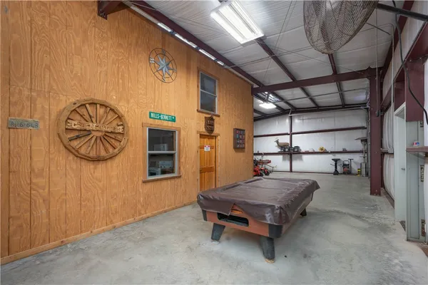 a living room with a furniture and a table