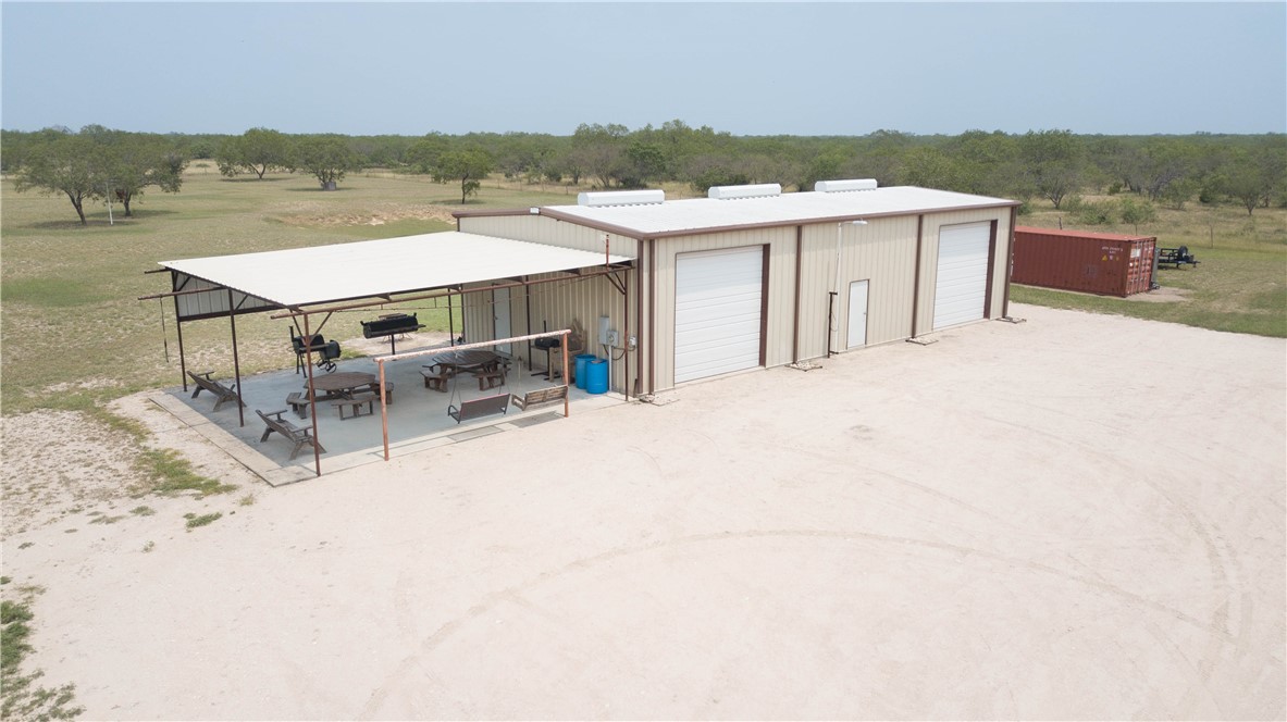 227 N Hollow Alice, TX 78332 - Photo 25 of 27 a roof deck with table and chairs