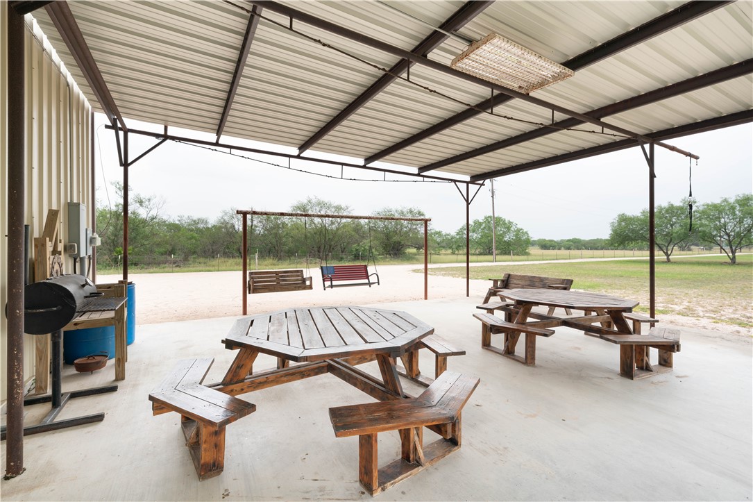 227 N Hollow Alice, TX 78332 - Photo 7 of 27 a view of swimming pool with outdoor seating