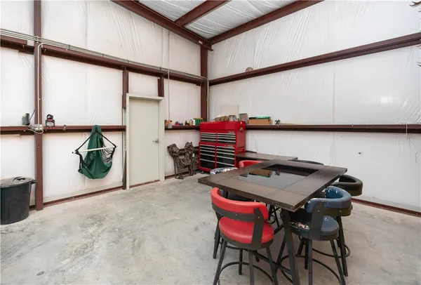 a backyard of a house with seating space