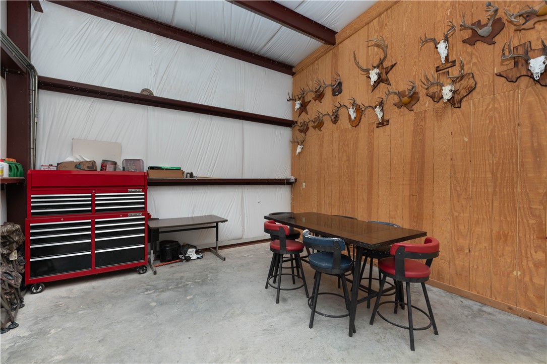 227 N Hollow Alice, TX 78332 - Photo 10 of 27 a view of a room with furniture and a chandelier