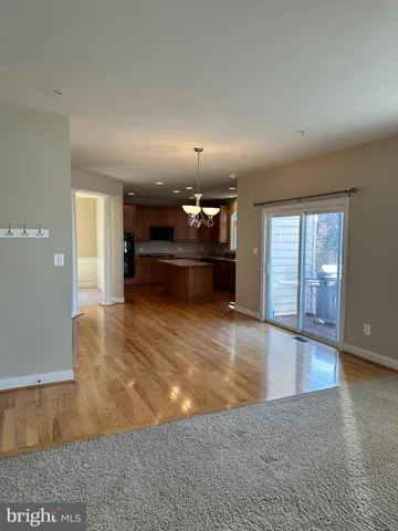 a view of a terrace with wooden floor and city view