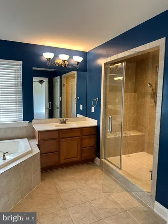 a bathroom with a sink and a bathtub