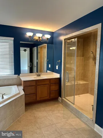 a bathroom with a sink and a bathtub