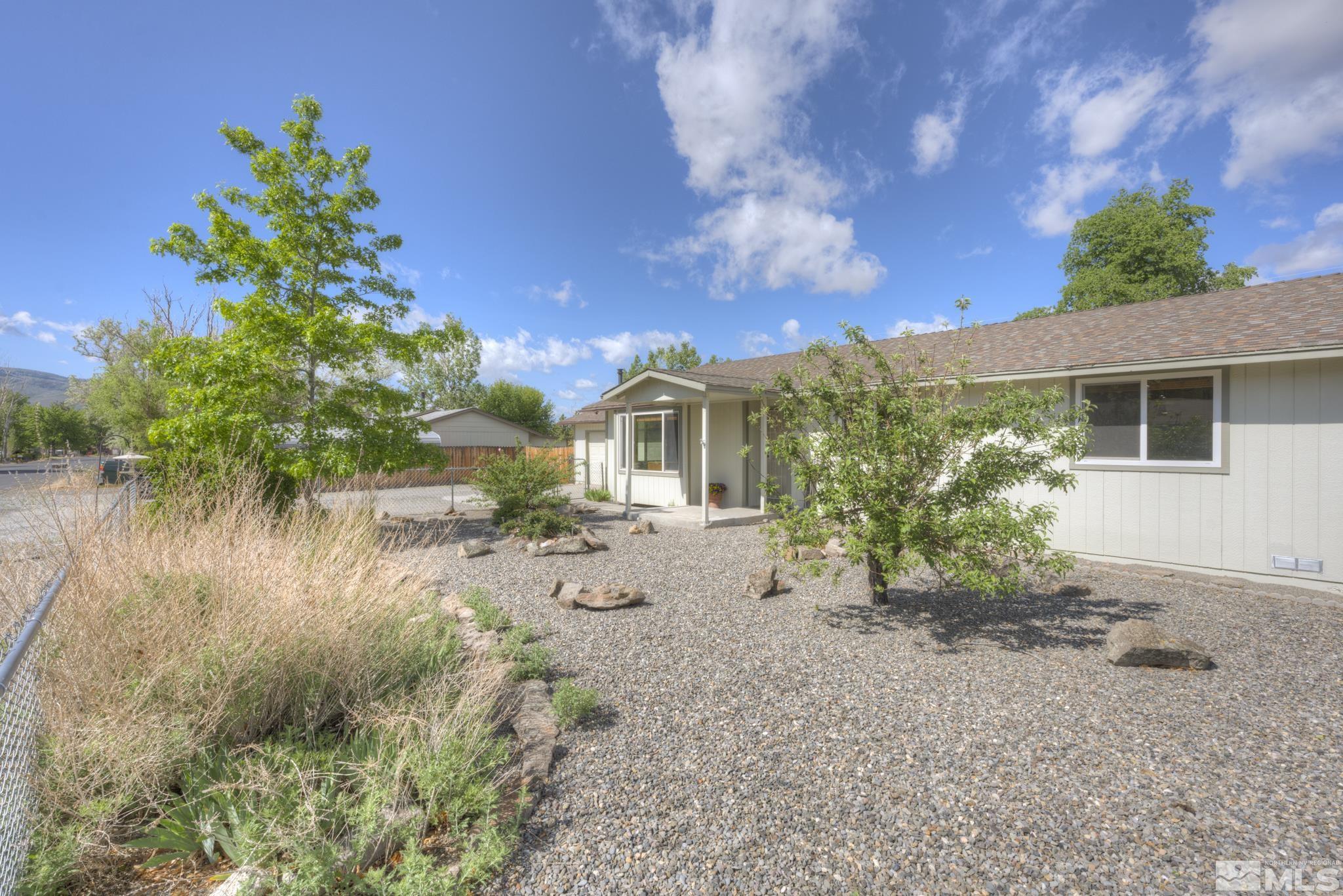 3825 Brant Street Reno, NV 89508 - Photo 3 of 39 a view of a house with a yard