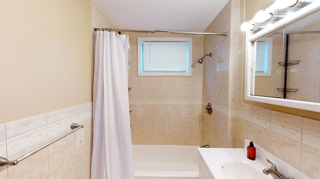 30 Roseclair Street, Unit 2 Boston, MA 02125 - Photo 11 of 14 a bathroom with a sink and a shower