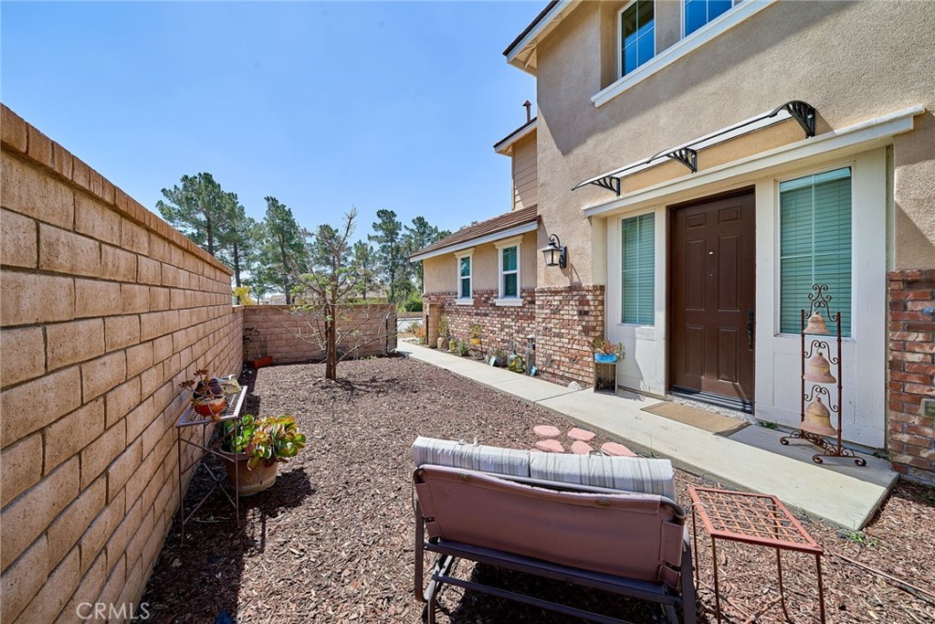 11568 Lark Drive Rancho Cucamonga, CA 91701 - Photo 3 of 20 a view of a house with backyard and sitting area