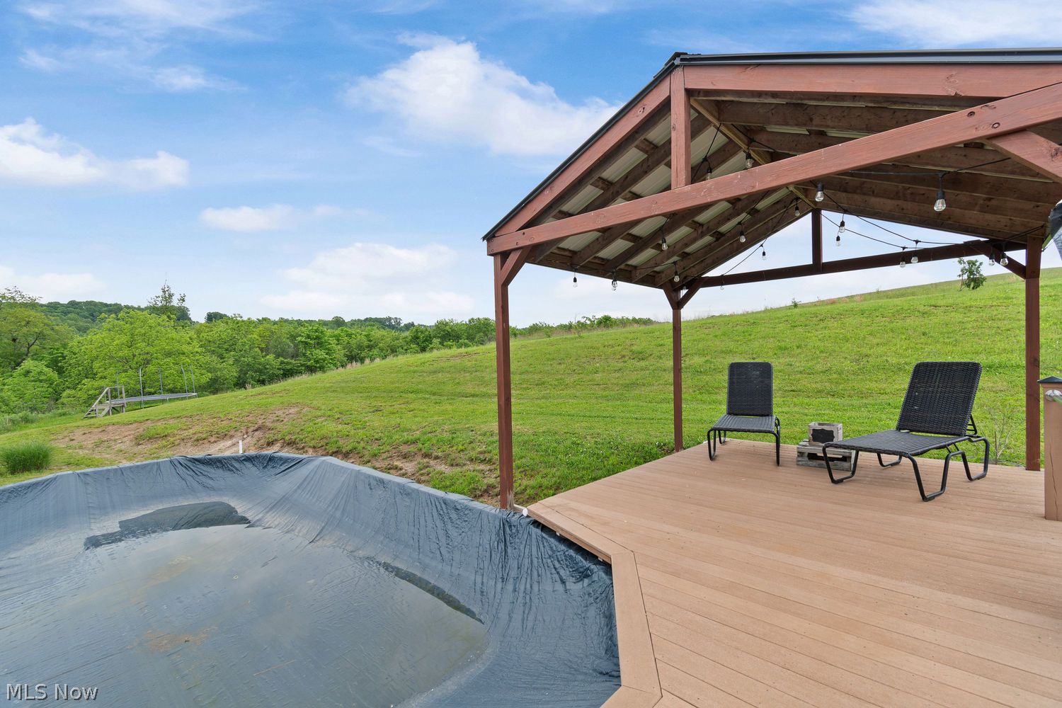 5230 Kinsey Valley Road Southwest New Philadelphia, OH 44663 - Photo 35 of 39 pool seating and access deck