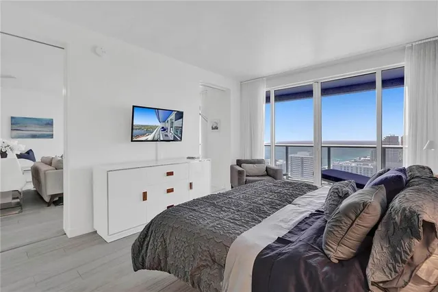 a view of a city with tall buildings in ocean