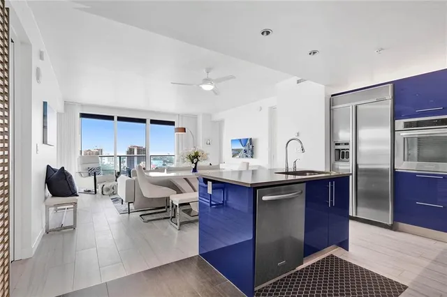 a bedroom with a bed and a couch