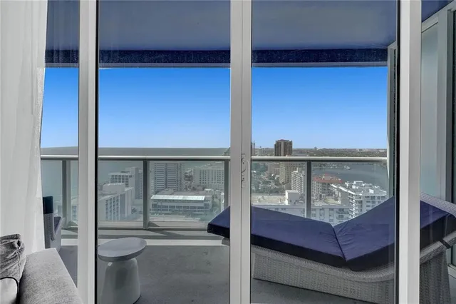 a bathroom with a sink and a window