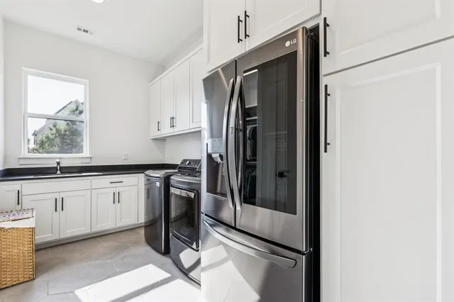 a bathroom with a bathtub and a sink
