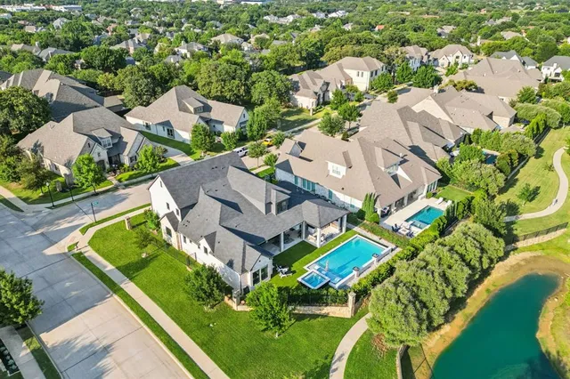 a view of a patio with swimming pool table and chairs