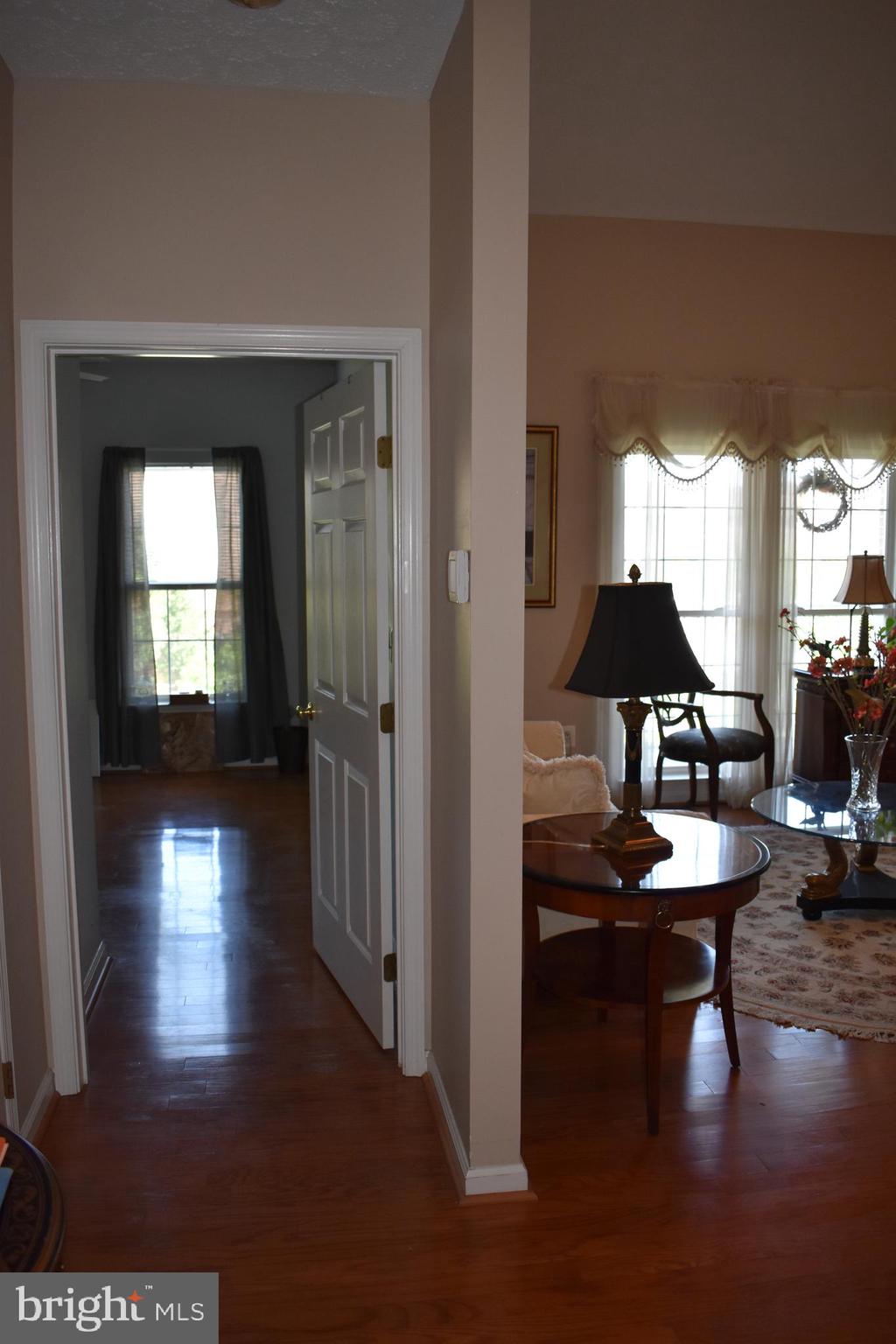 5236 Millfield Road, Unit 5236 Baltimore, MD 21237 - Photo 28 of 54 a dining room with furniture and wooden floor