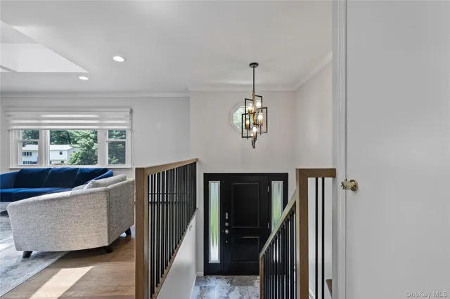 a bathroom with a granite countertop sink a toilet and bathtub