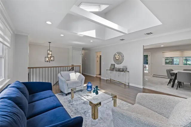 a kitchen with a sink a stove and cabinets