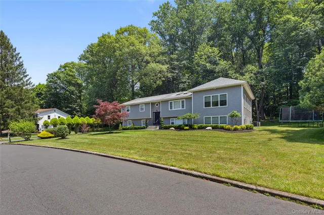 a view of a chairs and table on the wooden floor