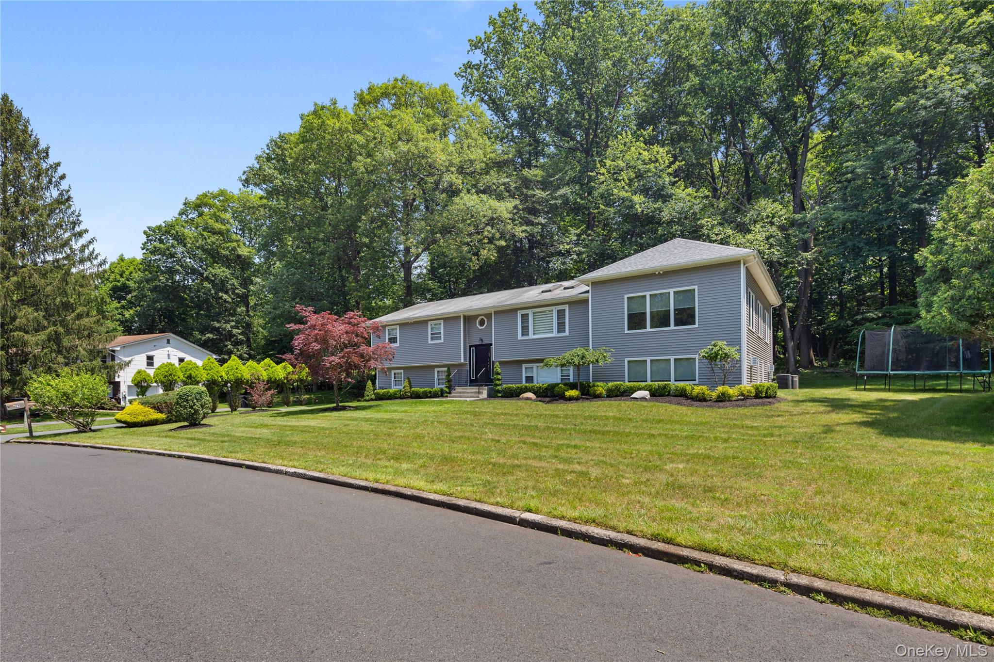 29 Skylark Drive Spring Valley, NY 10977 - Photo 2 of 44 a house view with a outdoor space
