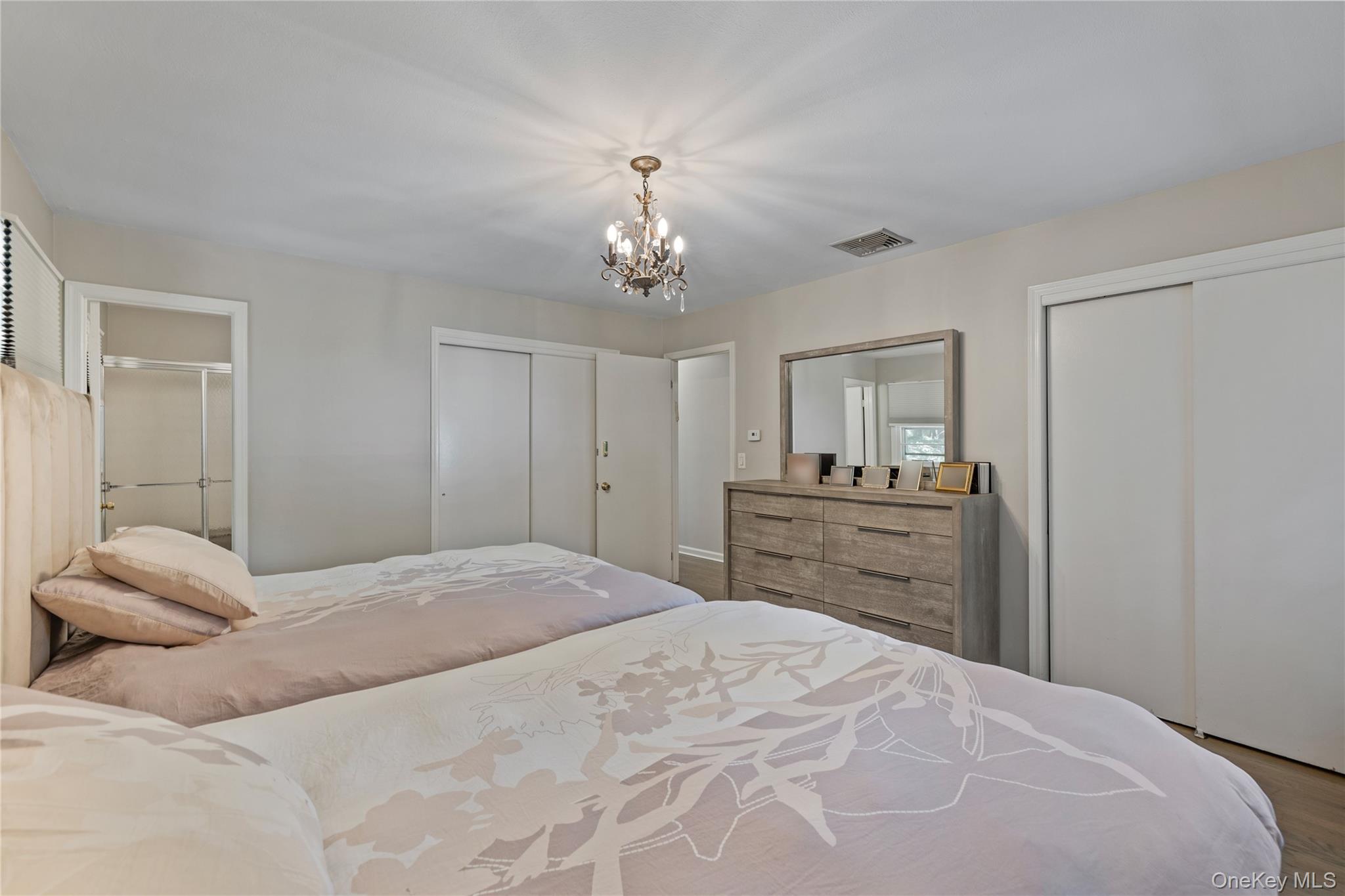 29 Skylark Drive Spring Valley, NY 10977 - Photo 25 of 44 a bedroom with a bed and a dresser