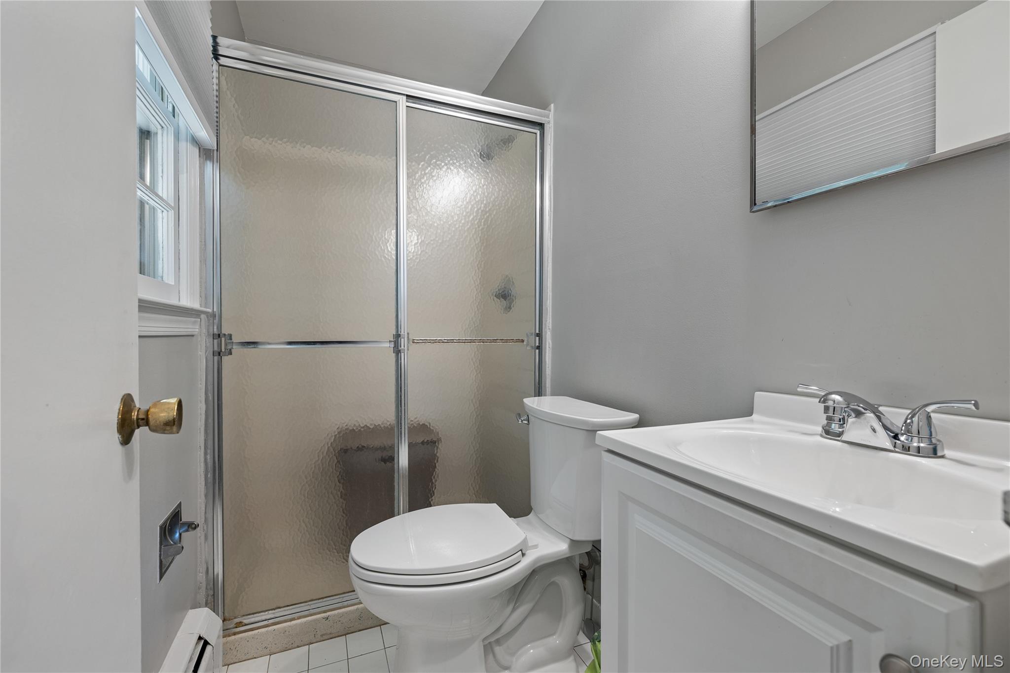 29 Skylark Drive Spring Valley, NY 10977 - Photo 27 of 44 a bathroom with a sink toilet and shower