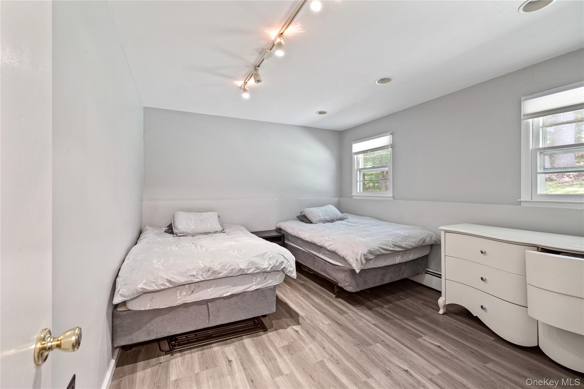 29 Skylark Drive Spring Valley, NY 10977 - Photo 34 of 44 a bedroom with a bed and window