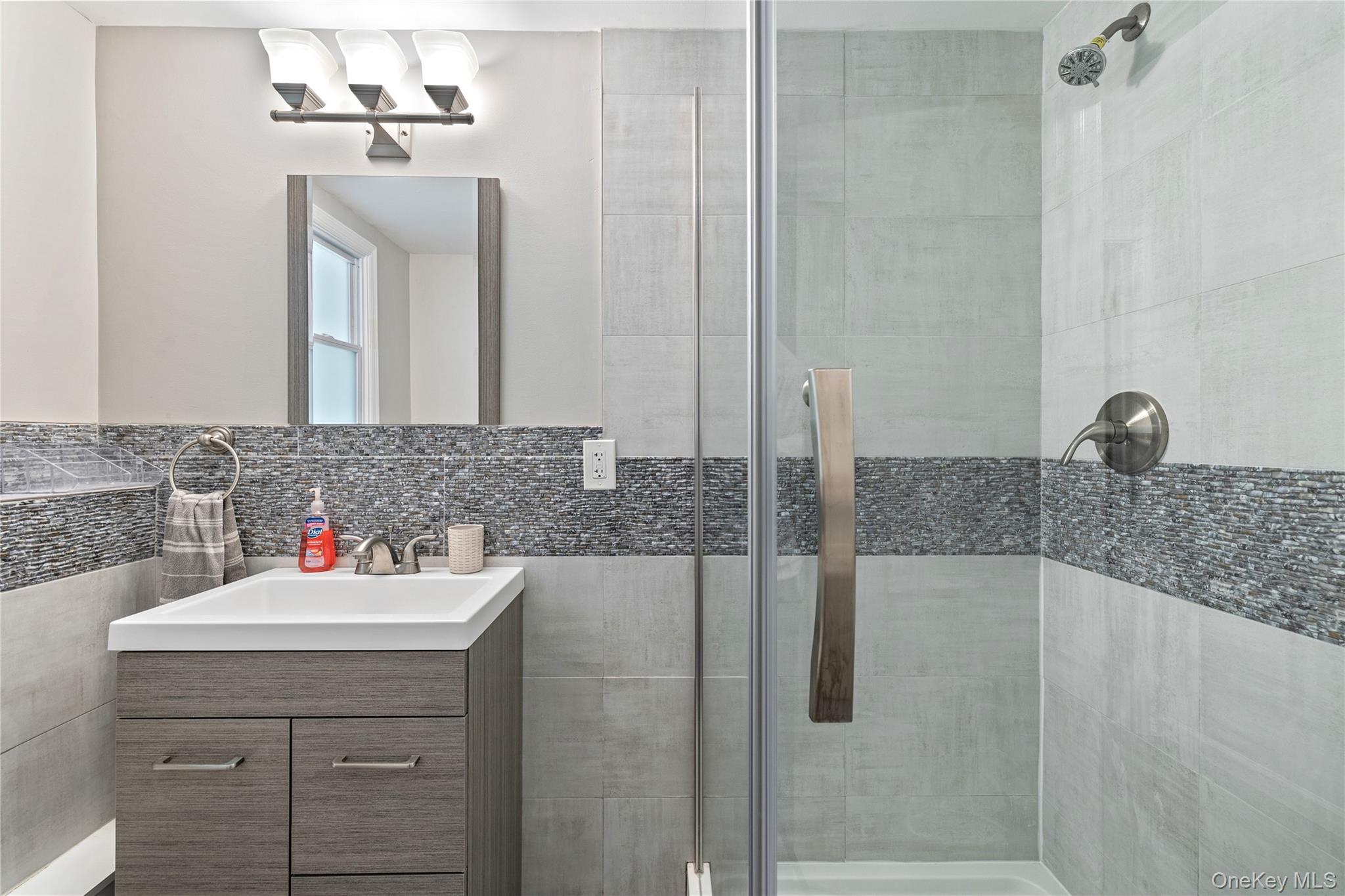 29 Skylark Drive Spring Valley, NY 10977 - Photo 36 of 44 a bathroom with a sink and a mirror