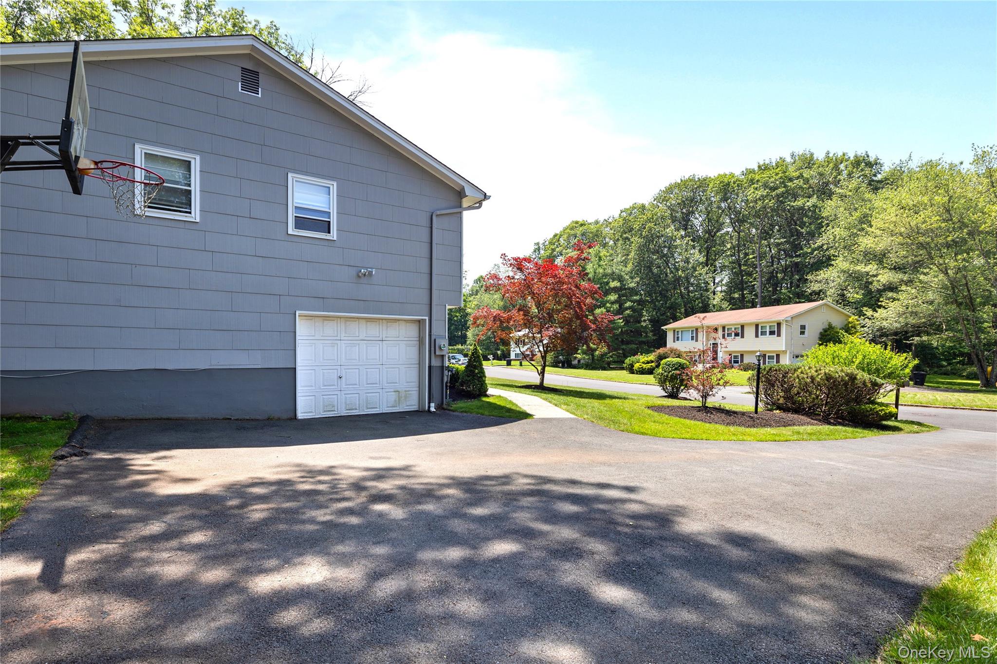 29 Skylark Drive Spring Valley, NY 10977 - Photo 4 of 44 a view of a house with a yard and large tree