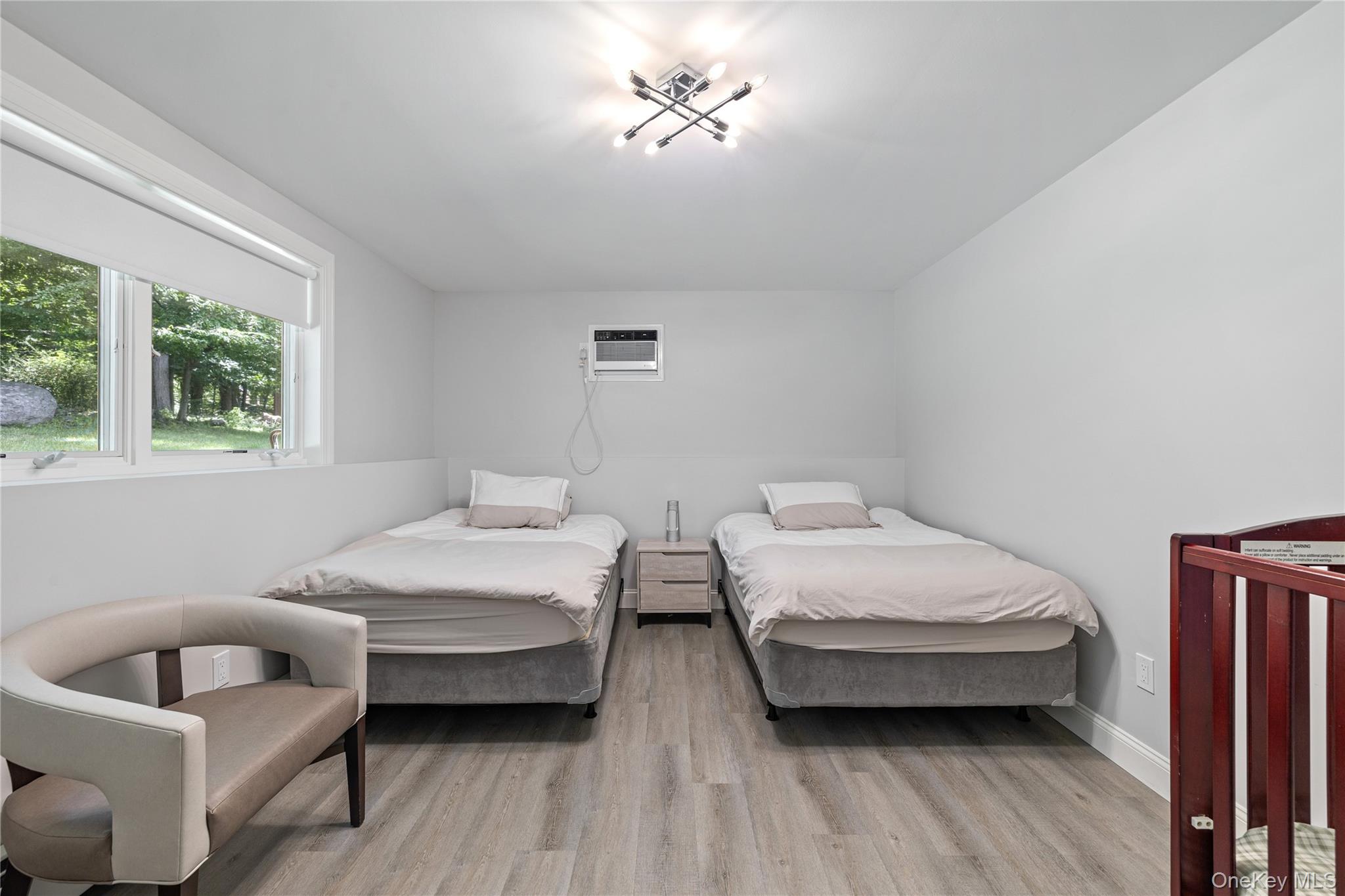 29 Skylark Drive Spring Valley, NY 10977 - Photo 41 of 44 a bedroom with two beds and a couch