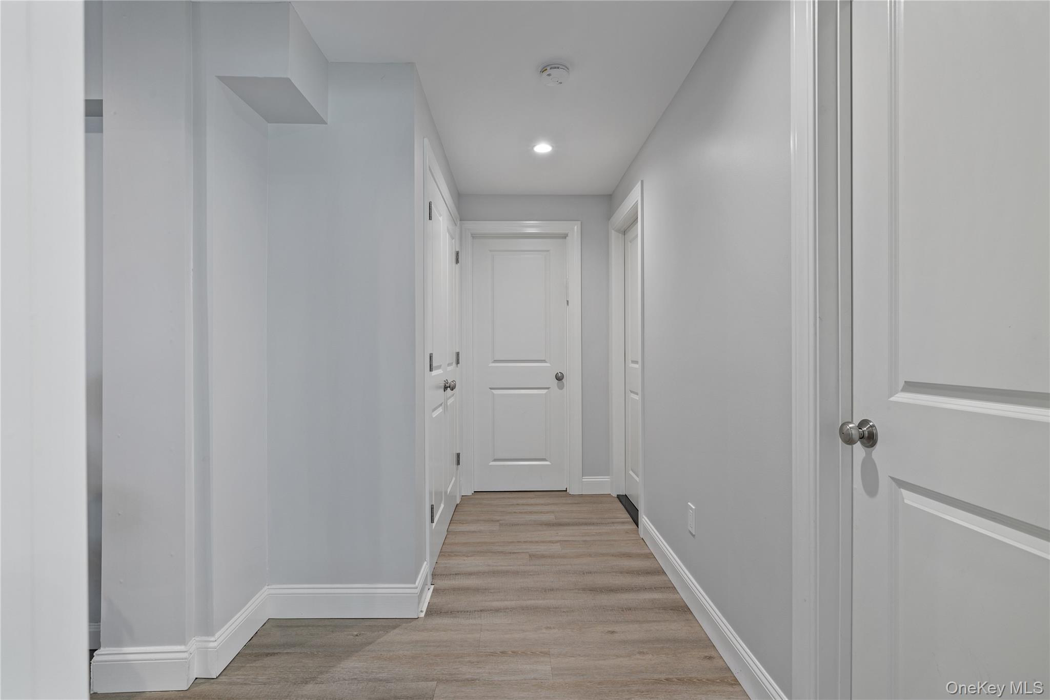 29 Skylark Drive Spring Valley, NY 10977 - Photo 44 of 44 a view of a hallway with wooden floor