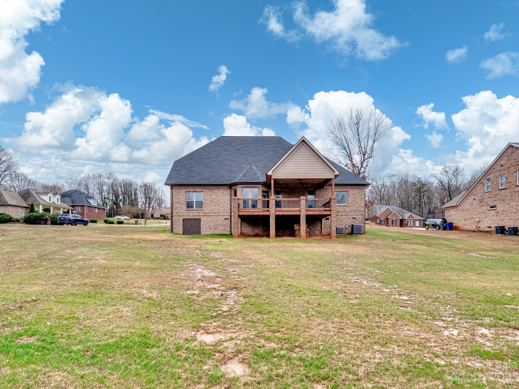 213 9th Street Northeast Conover, NC 28613 - Photo 37 of 38 a front view of a house with a big yard