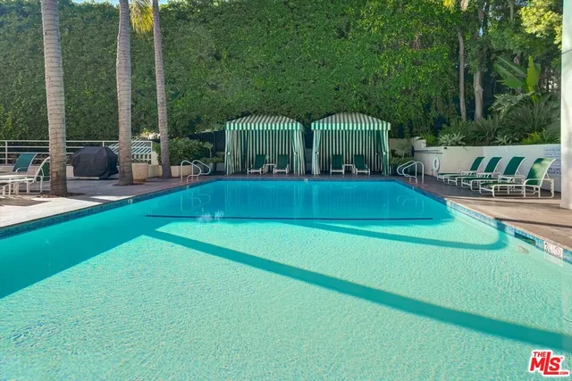 a view of a house with backyard and a slide