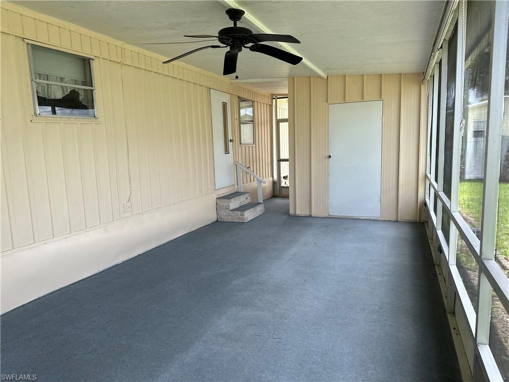240 Cape Sable Drive Naples, FL 34104 - Photo 21 of 21 a view of empty room with wooden floor and fan