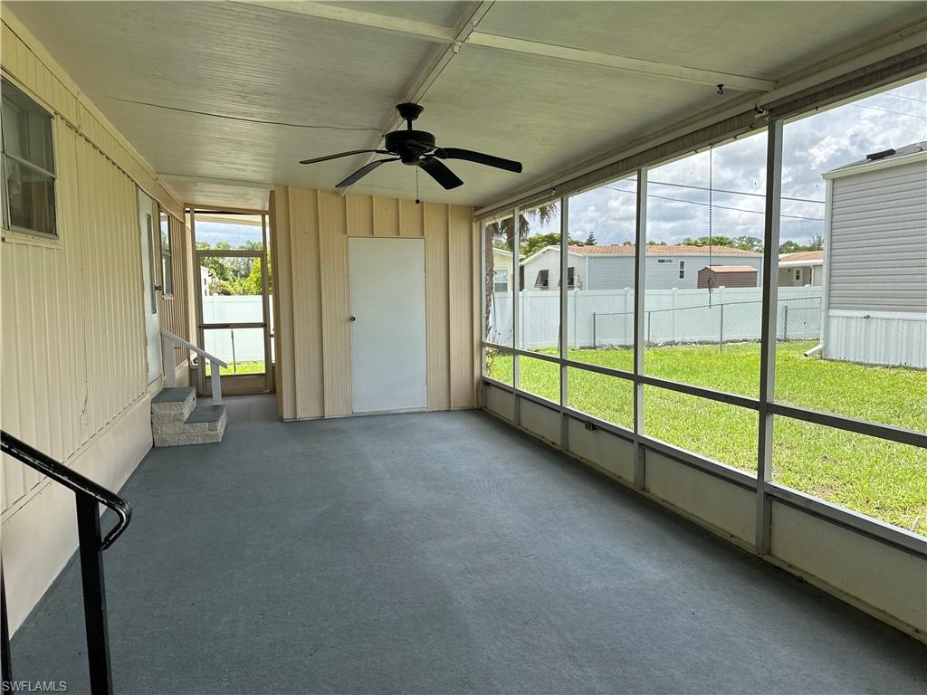 240 Cape Sable Drive Naples, FL 34104 - Photo 3 of 21 a view of an empty room and window