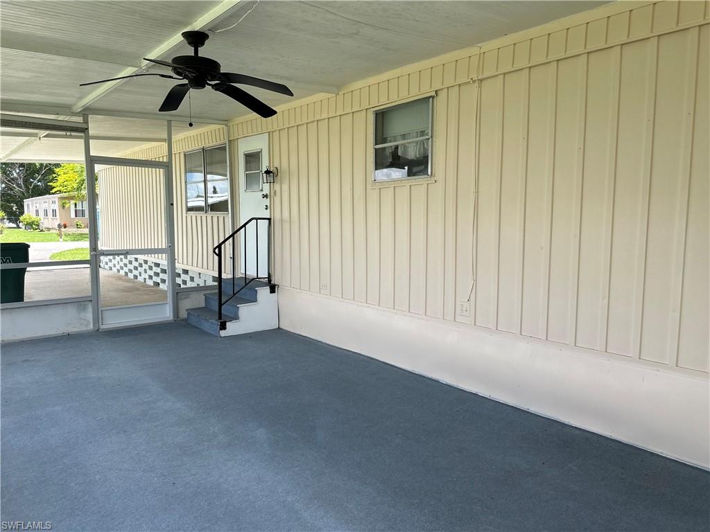 240 Cape Sable Drive Naples, FL 34104 - Photo 4 of 21 a view of an empty room with a window