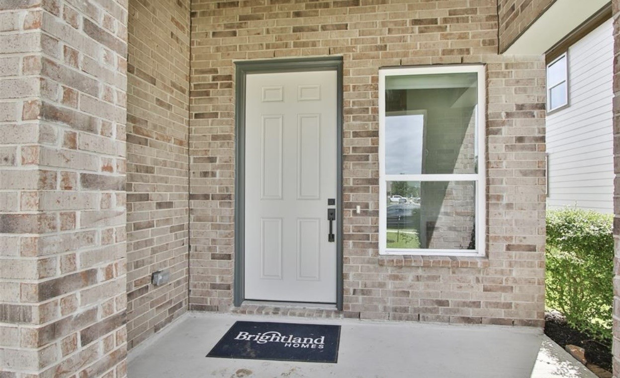 104 Lisa Marie Drive Angleton, TX 77515 - Photo 4 of 33 a view of a door and a window