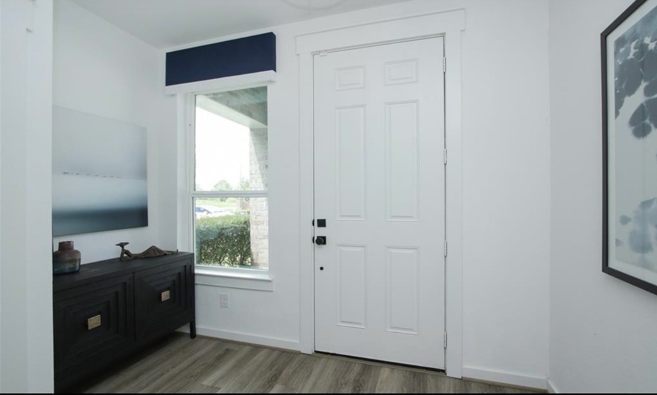 104 Lisa Marie Drive Angleton, TX 77515 - Photo 7 of 33 a view of workspace with wooden floor cabinet and mirror