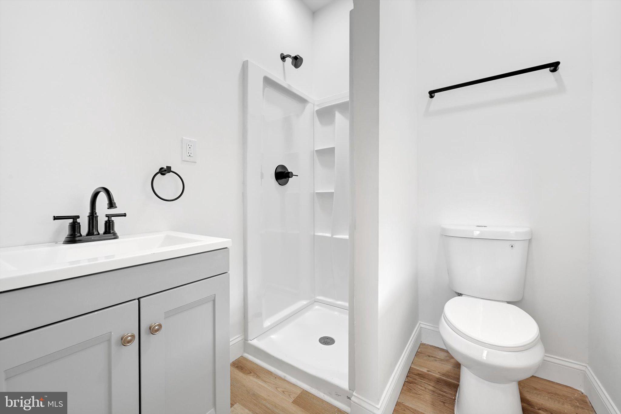 170 South Franklin Street Pottstown, PA 19464 - Photo 16 of 31 a bathroom with a sink a toilet and shower