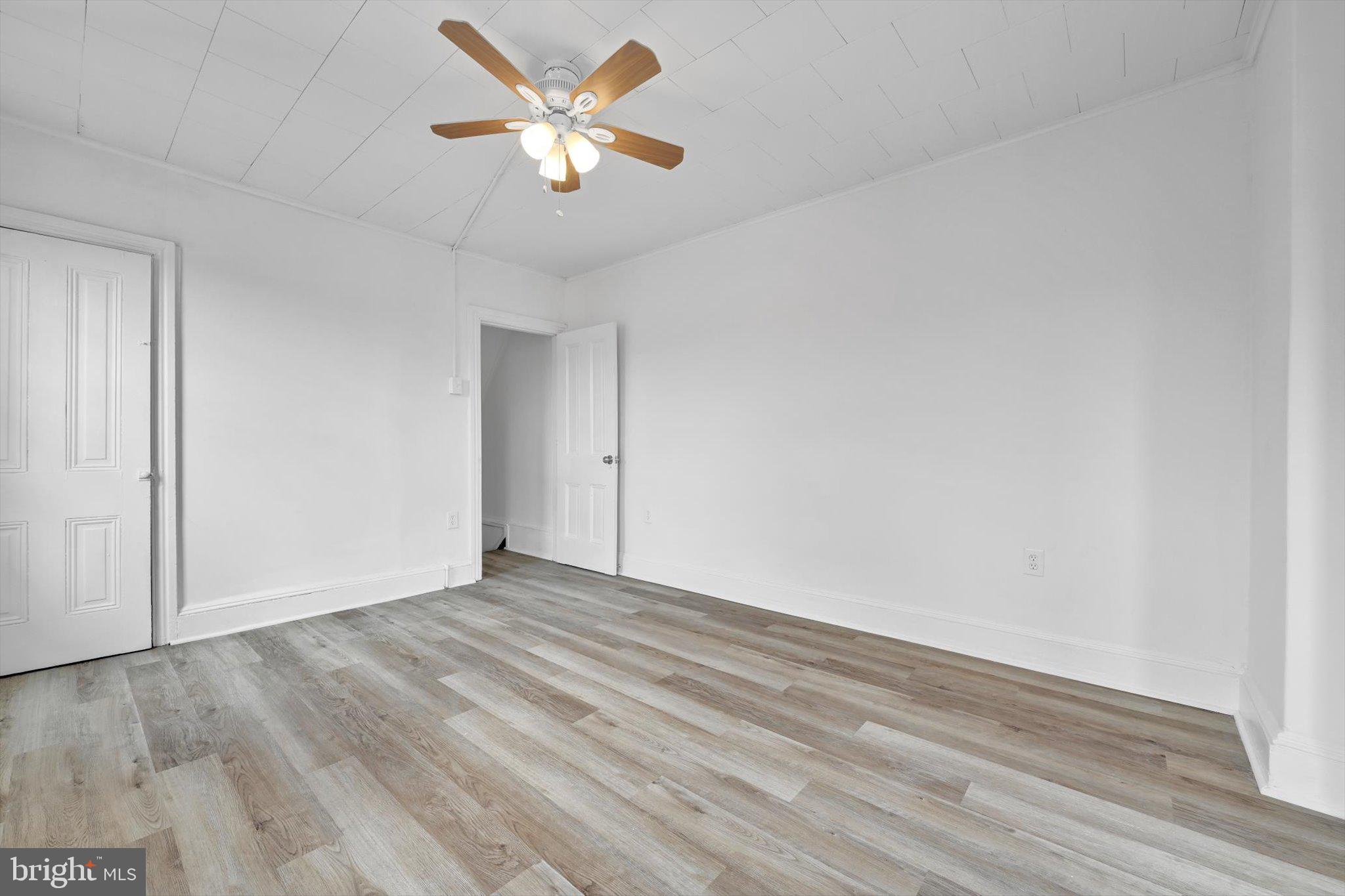 170 South Franklin Street Pottstown, PA 19464 - Photo 18 of 31 a view of an empty room with wooden floor