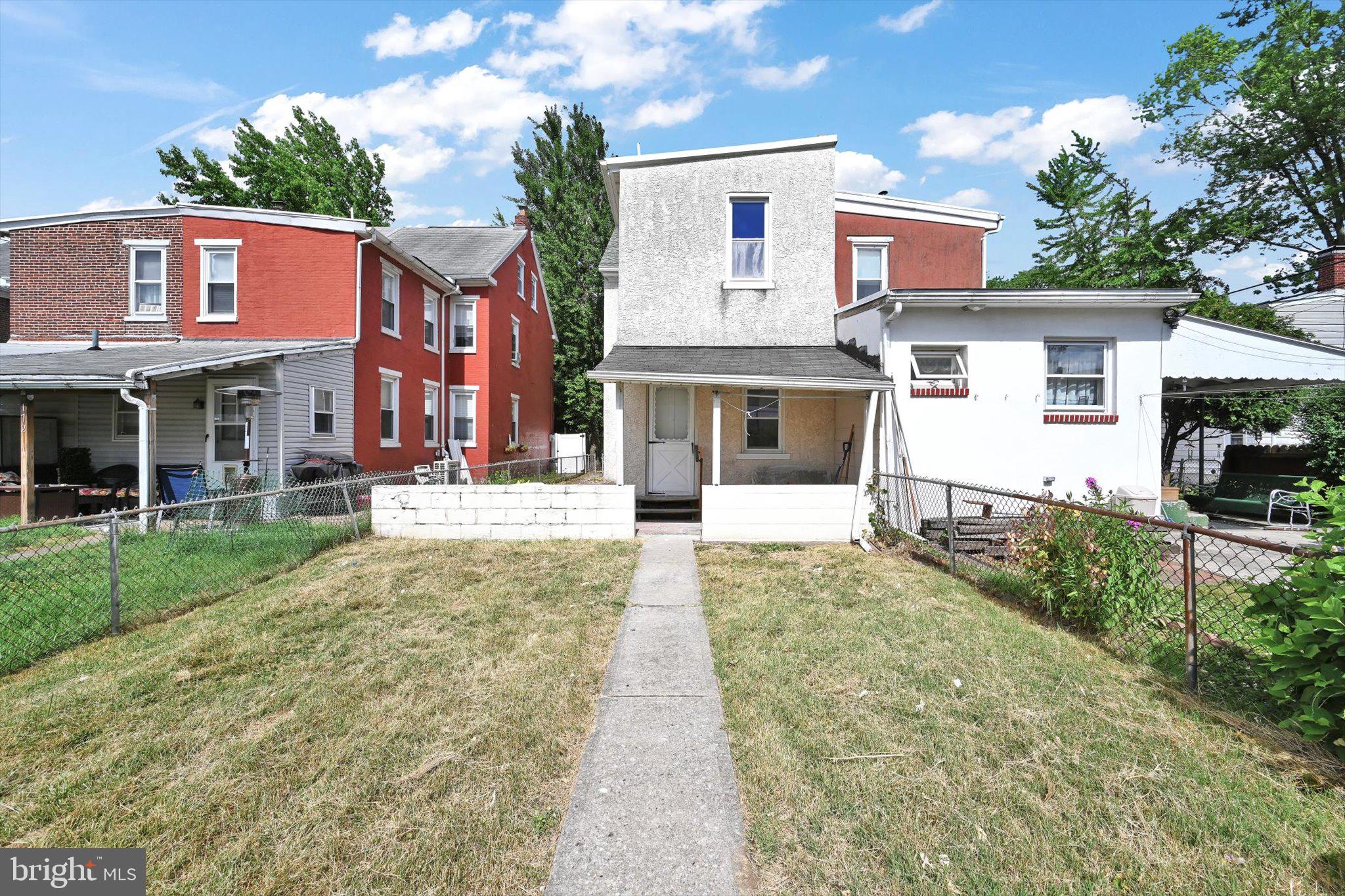 170 South Franklin Street Pottstown, PA 19464 - Photo 29 of 31 a front view of a house with a yard and trees