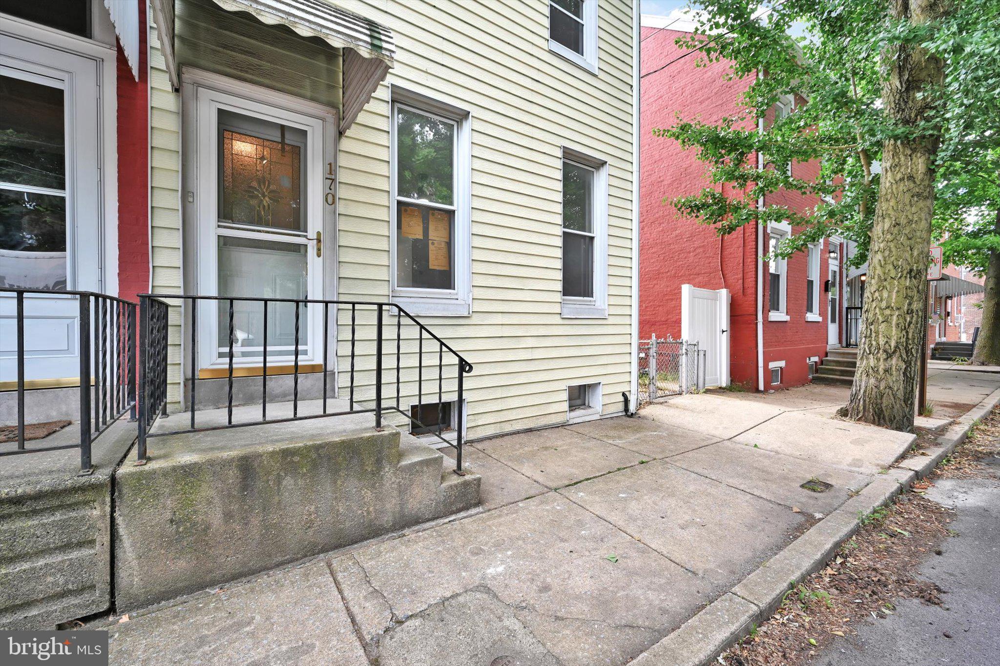 170 South Franklin Street Pottstown, PA 19464 - Photo 4 of 31 a view of a house with a chair and wooden fence