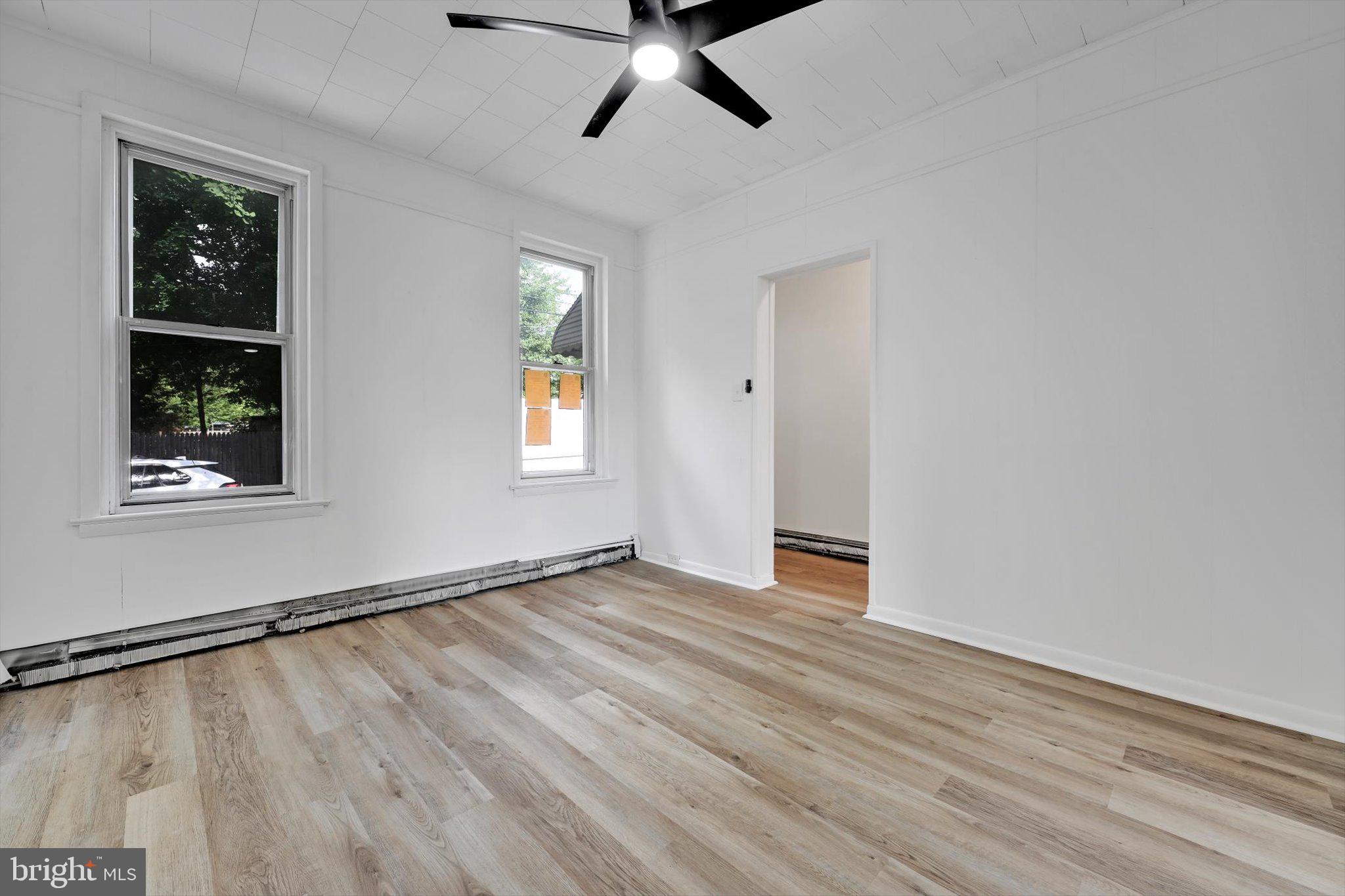 170 South Franklin Street Pottstown, PA 19464 - Photo 7 of 31 wooden floor in an empty room with a window