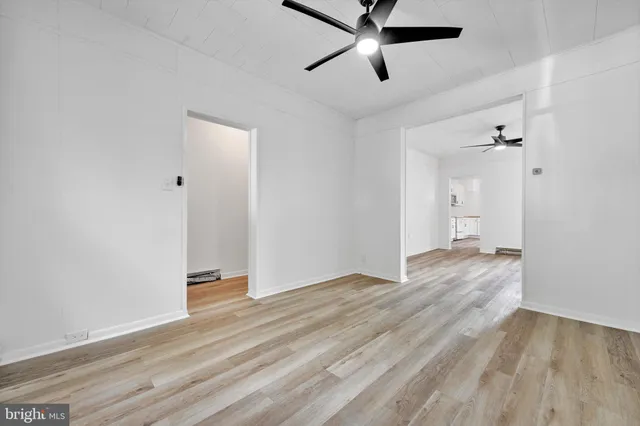 a view of an empty room and window