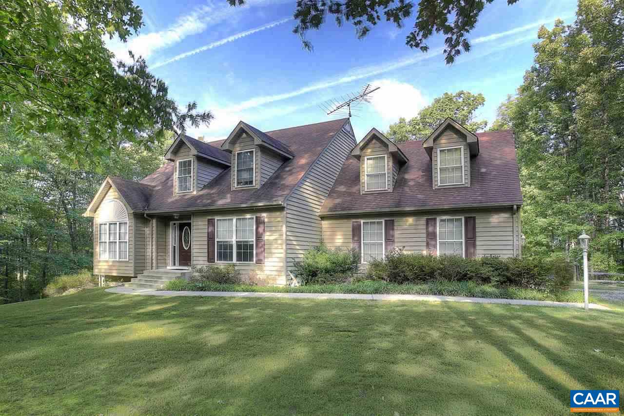 4099 Roundabout Road Louisa, VA 23093 - Photo 1 of 25 a front view of a house with garden