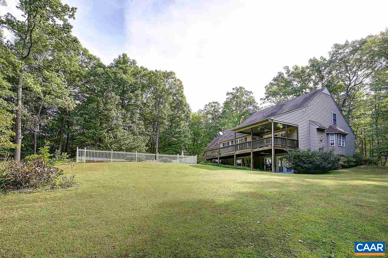 4099 Roundabout Road Louisa, VA 23093 - Photo 24 of 25 a house with trees in the background
