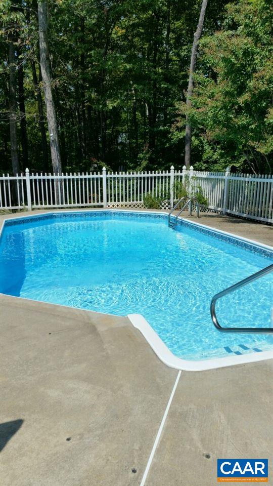4099 Roundabout Road Louisa, VA 23093 - Photo 3 of 25 a view of a backyard with fence