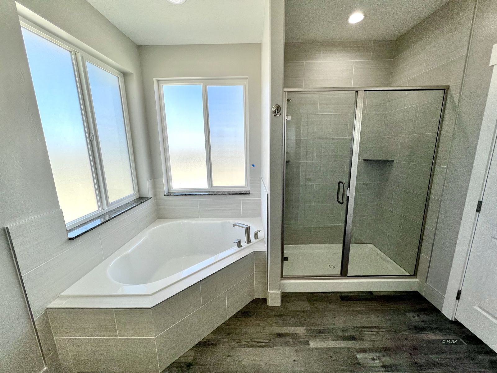 1151 Sun Vly Road Spring Creek, NV 89815 - Photo 25 of 30 a bathroom with a bathtub and a shower