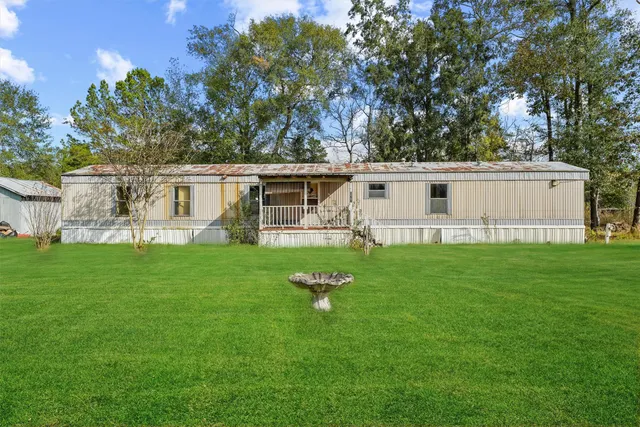 a house view with a garden space